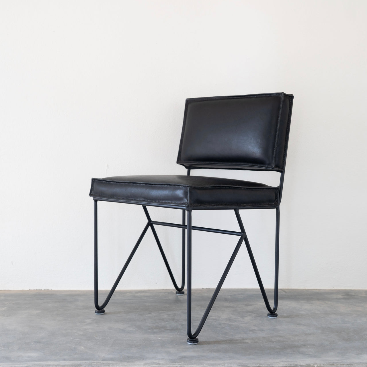 Upholstered Saddle Leather Low Back Dining Chair