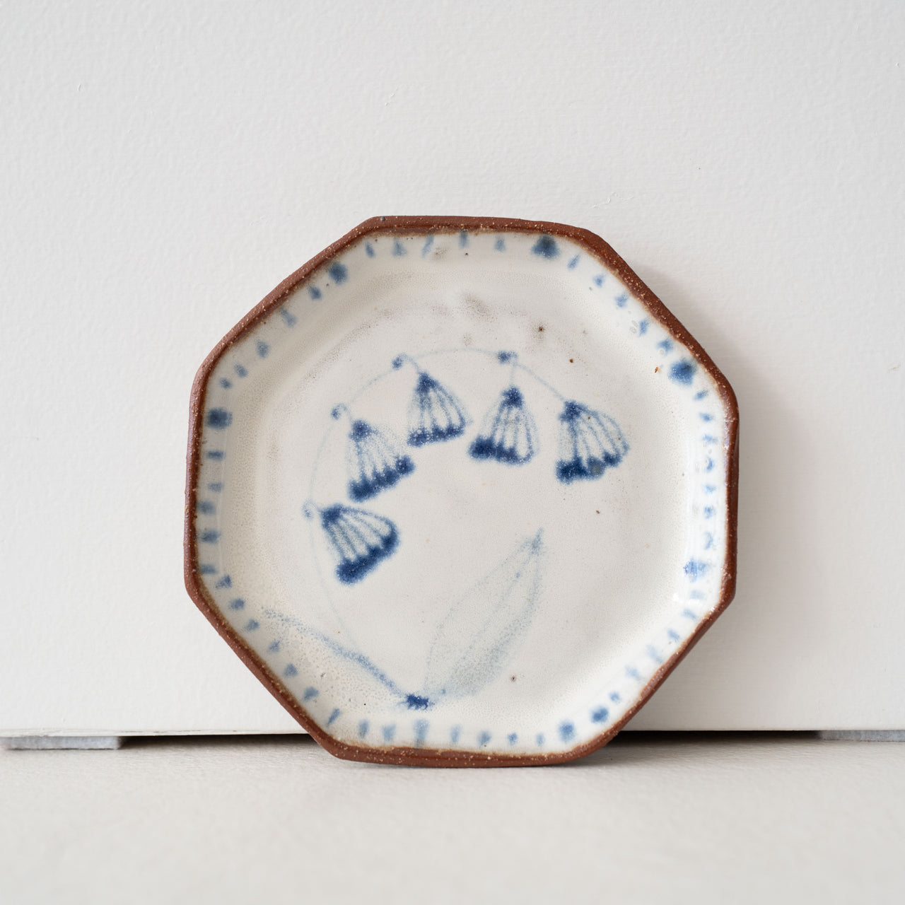 Spako Small Octagon Plate: Arced Flower