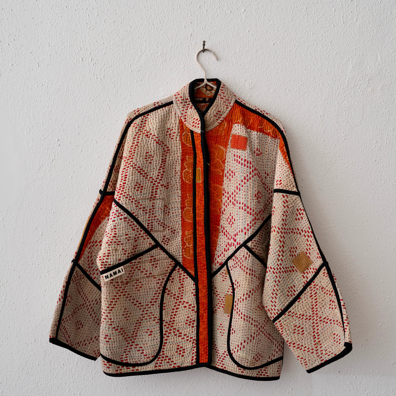 Namai Ladhiya Quilted Mix Match Kantha Jacket: Orange, Black, Tan